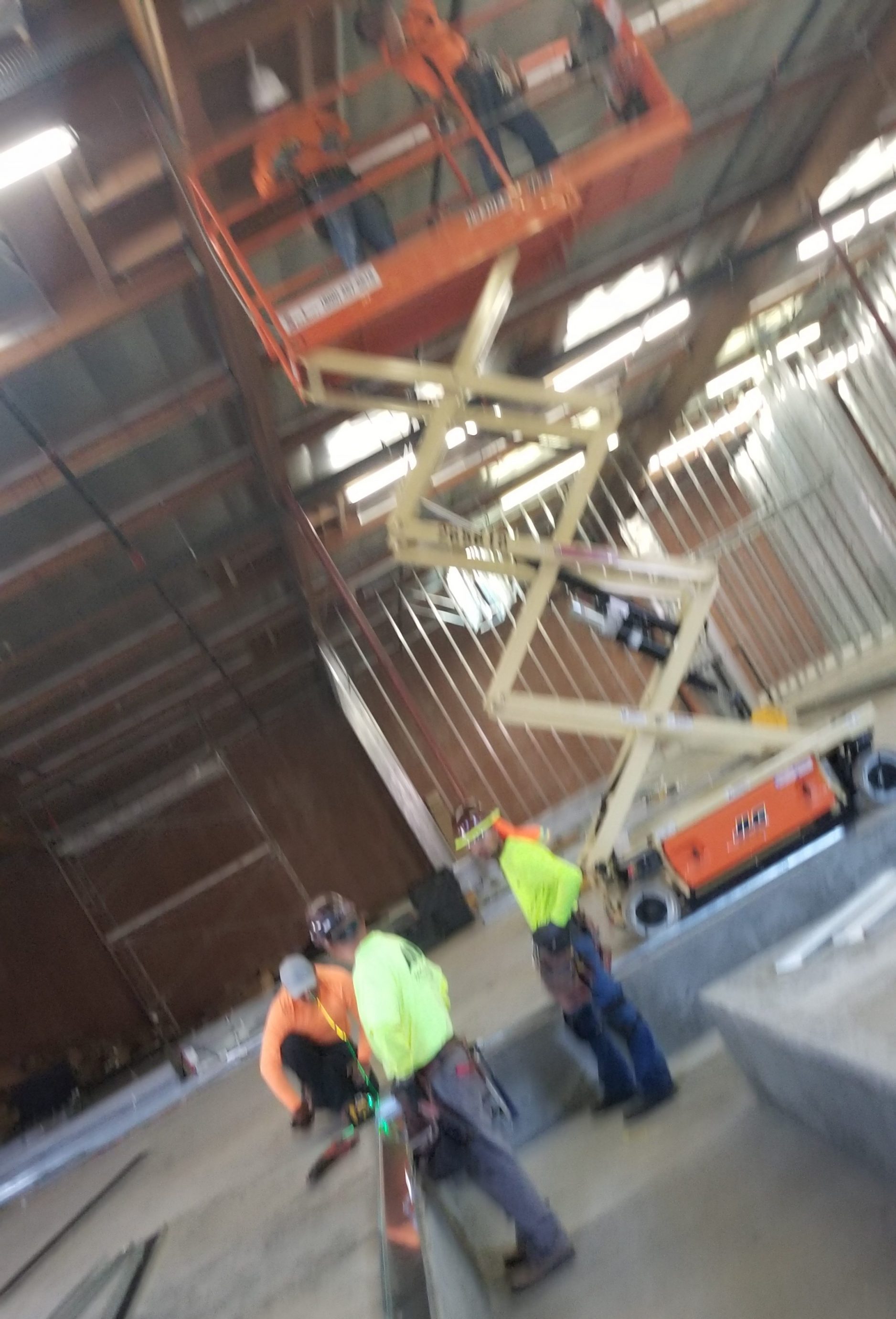 Image of people working on steel stud framing construction, Sierra Drywall Inc, Steel Stud Framing
